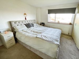 Bedroom One- click for photo gallery